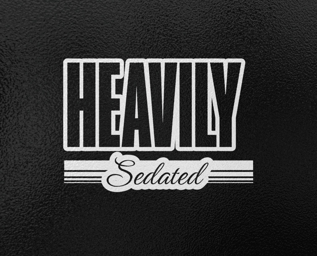 Black T-Shirt with Black and White Graphic Text "Heavily Sedated" Retro Style